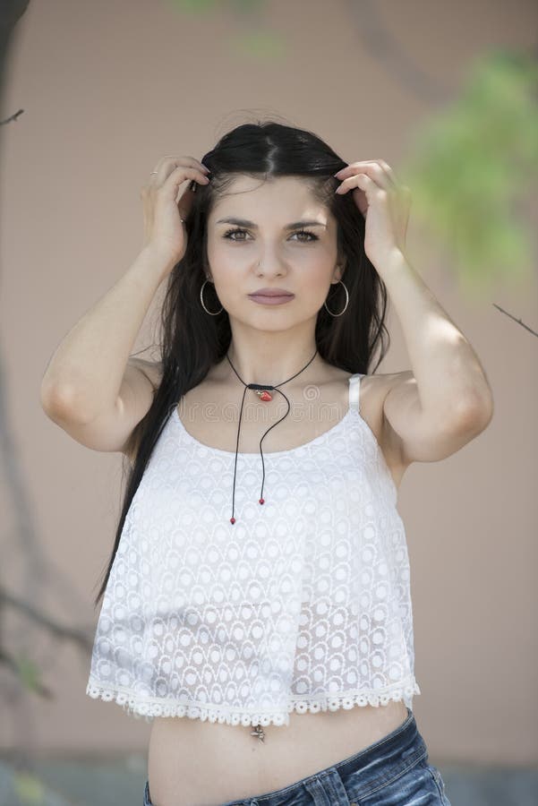 Portrait of Woman at the Beach Wearing Coral Dress Stock Image - Image ...