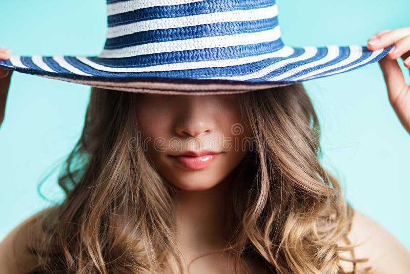 Portrait of a woman in elegant hat with a wide brim. Beauty, fashion concept. royalty free stock images Portrait of a woman in elegant hat with a wide brim. Beauty, fashion concept. royalty free stock images