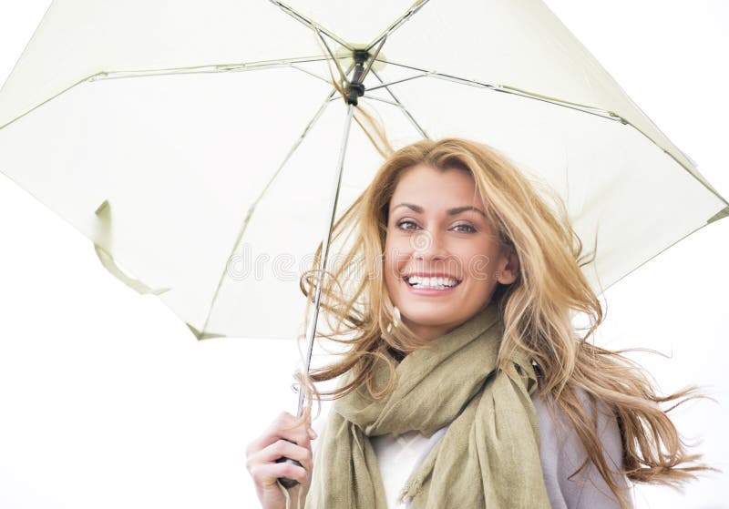 Portrait Of Woman Holding Umbrella