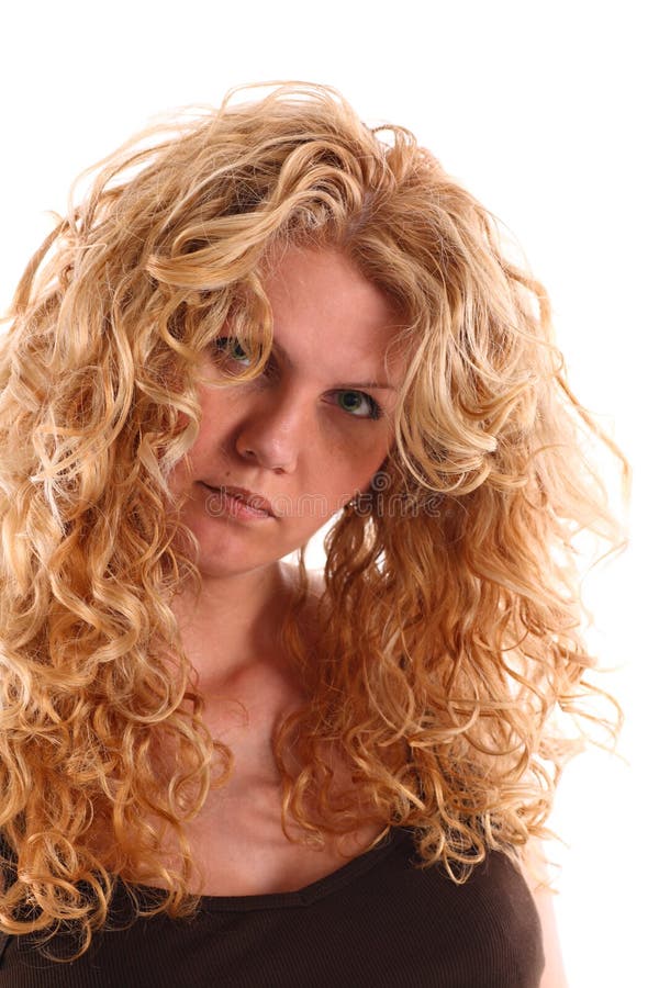 Portrait of a woman with long blonde curly hair stock images Portrait of a woman with long blonde curly hair stock images