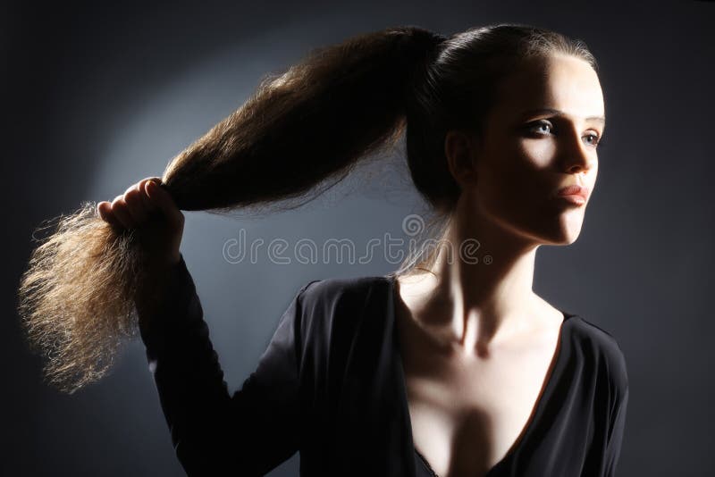 Portrait woman ponytail long hair style.