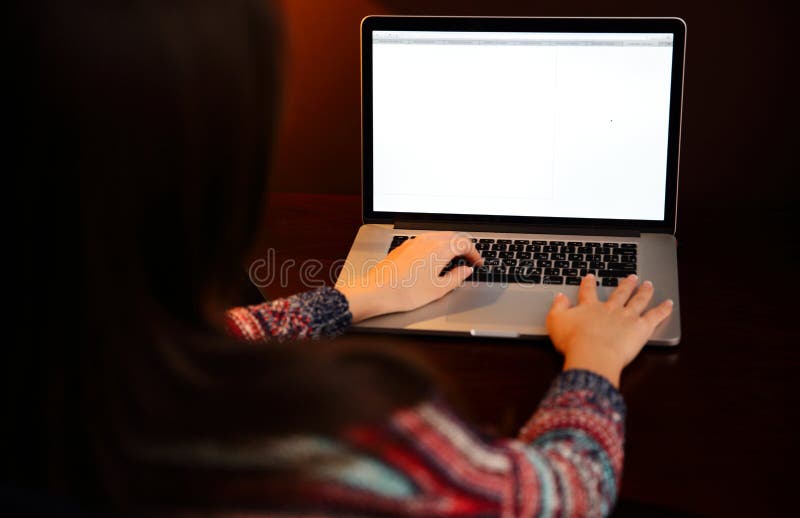 Portrait of a woman using laptop royalty free stock photos