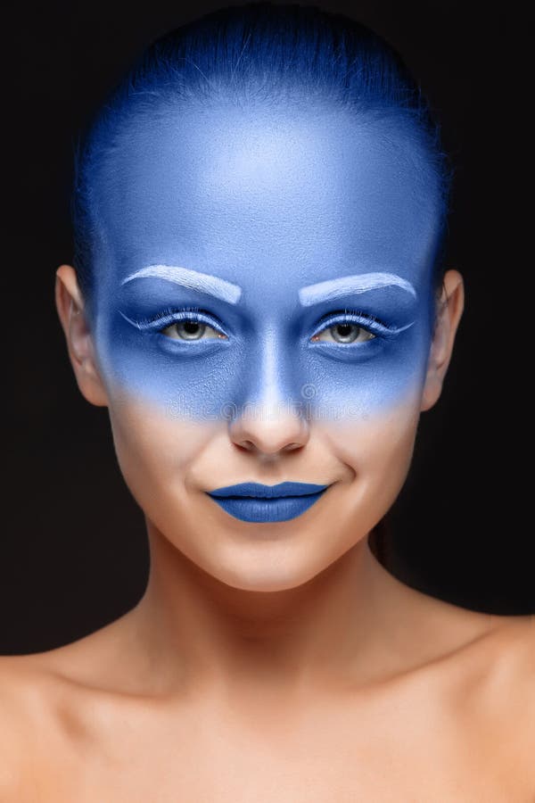 Portrait of a Woman Who is Posing Covered with Blue Paint Stock Image ...