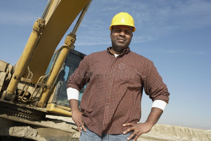 Portrait Of A Worker At Construction Site stock photos Portrait Of A Worker At Construction Site stock photos