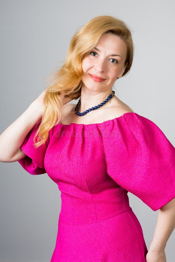 Portrait Of A 39 Year Old Woman In Pink Dress Stock Image Image Of