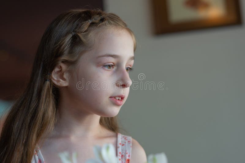 Portrait of a 9 years old female child. portrait concept of a child