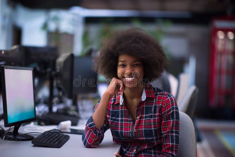 Portrait of a young African American woman in modern office