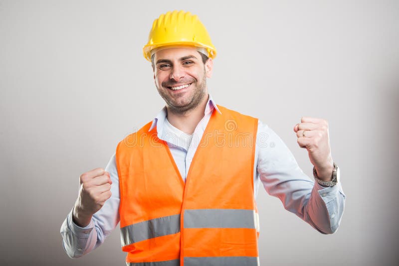 Portrait of young architect holding fists like fighting royalty free stock image Portrait of young architect holding fists like fighting royalty free stock image