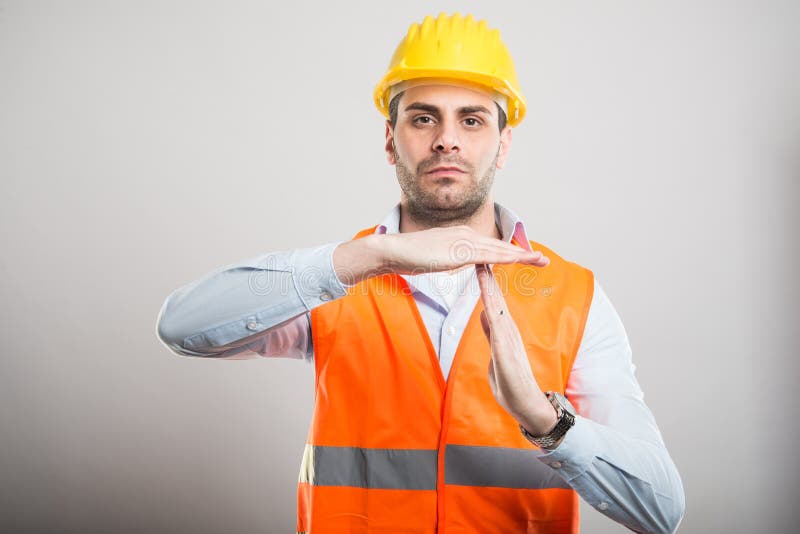 Portrait of young architect showing time out gesture stock photos Portrait of young architect showing time out gesture stock photos