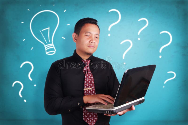 Businessman Typing on Laptop, Problem and Solution stock photo