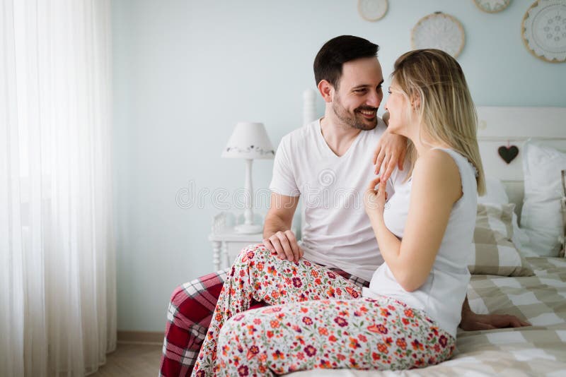 Portrait Of Young Loving Couple In Bedroom Stock Image Image Of Male