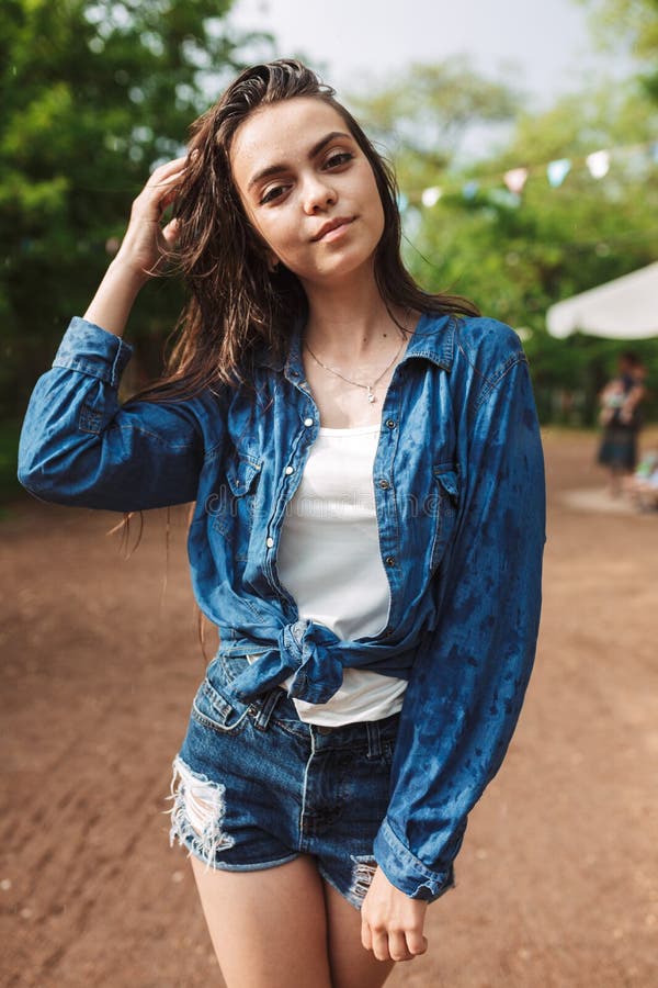 Portrait of Young Beautiful Lady with Wet Hair in Denim Shirt Dreamily ...