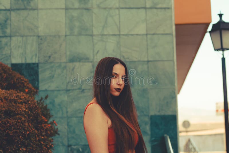 Portrait of young beautiful long hair hispanic girl