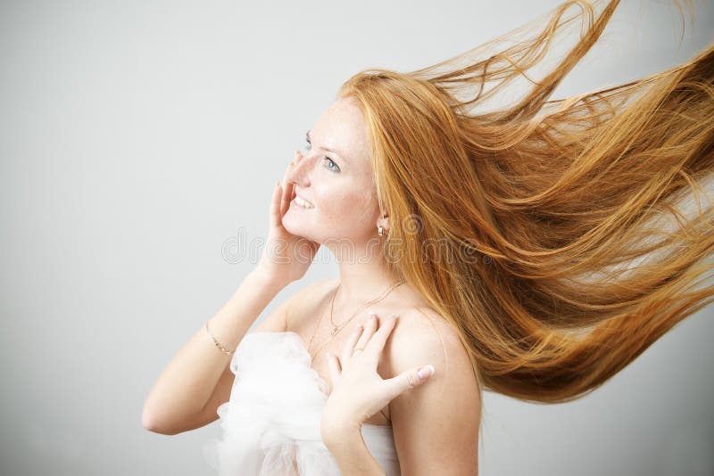 Portrait of a young beautiful red-haired woman. Hair Care