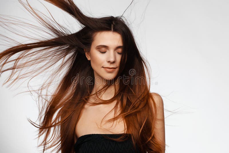 Portrait of a Young Beautiful Woman with Hair Flying from the Wind and Bare  Shoulders Stock Image - Image of glamour, isolated: 147619481