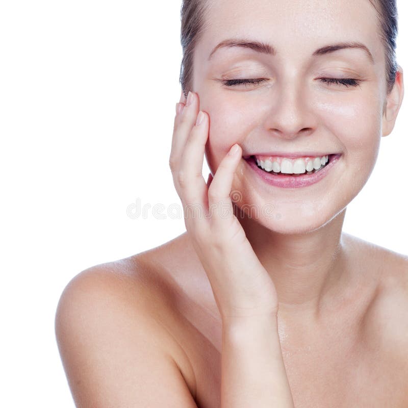 Portrait of young beautiful woman with perfect skin in water