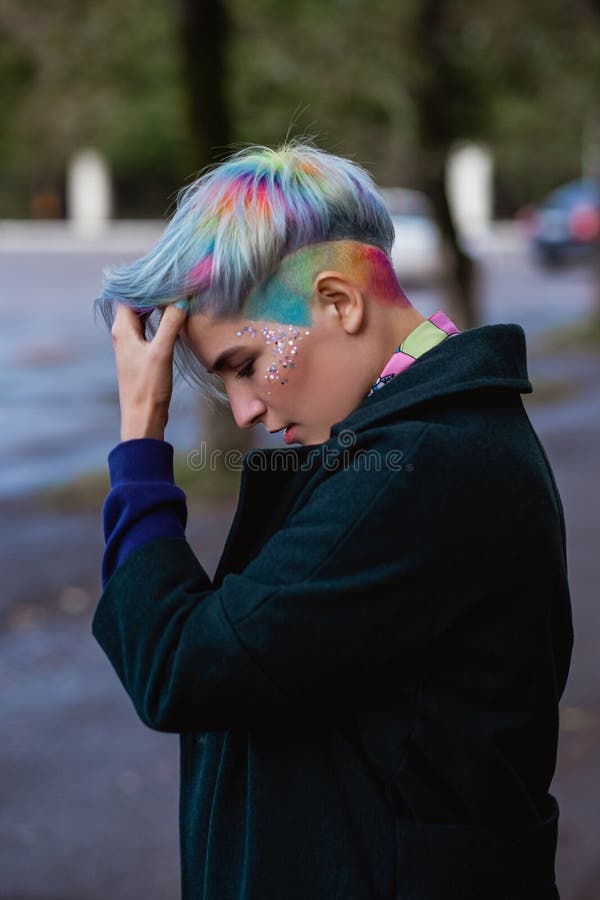 Portrait of a Young Beautiful Woman with a Short Haircut and Dyed Hair. Grey Main Color and Yellow, Green, Blue and Red Stock Photo - Image of hair, cosmetic: 181732890 Portrait of a Young Beautiful Woman with a Short Haircut and Dyed Hair. Grey Main Color and Yellow, Green, Blue and Red Stock Photo - Image of hair, cosmetic: 181732890