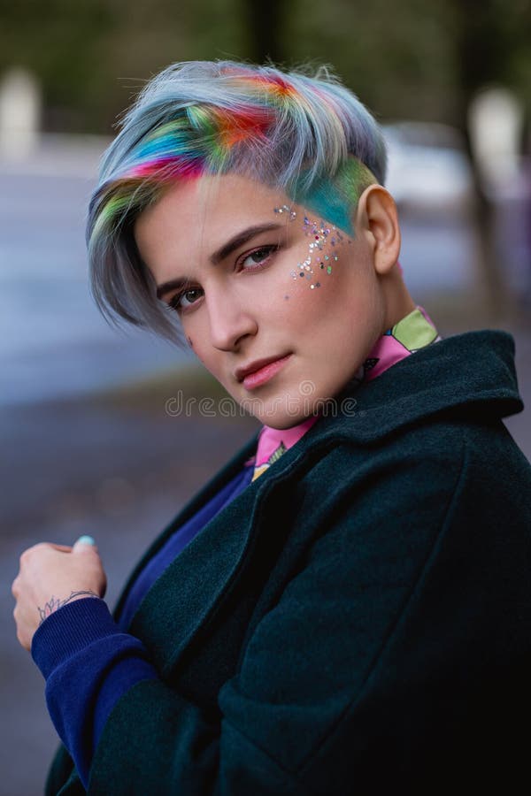 Portrait of a Young Beautiful Woman with a Short Haircut and Dyed Hair.  Grey Main Color and Yellow, Green, Blue and Red Stock Photo - Image of  girl, city: 181732944