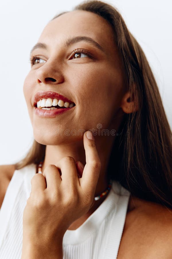 Portrait Of A Young Beautiful Woman With Tanned Skin Model On A White Background In A White T 