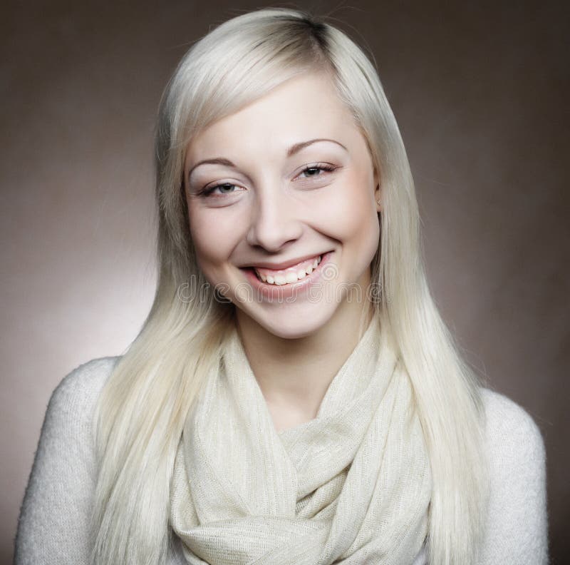 Portrait of young blonde positive female with cheerful expression - Lifestyle concept. Close up.