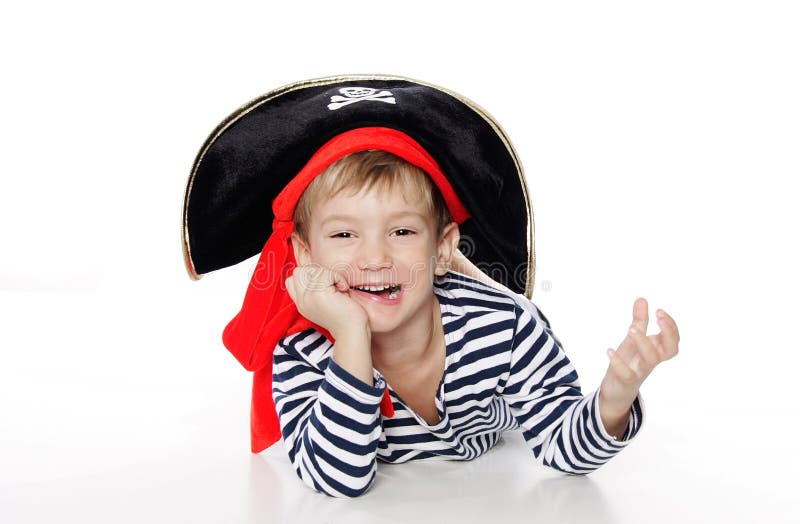 Portrait of young boy dressed as pirate