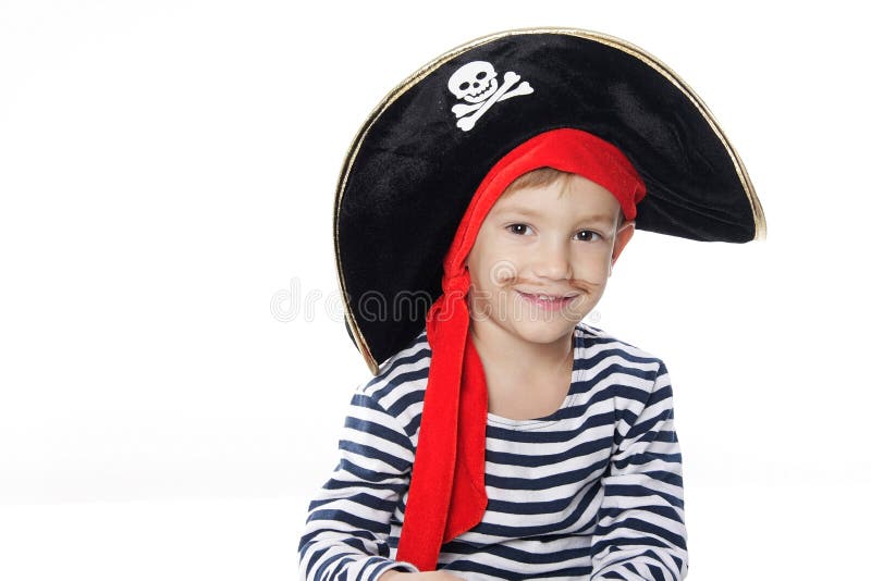 Portrait of young boy dressed as pirate