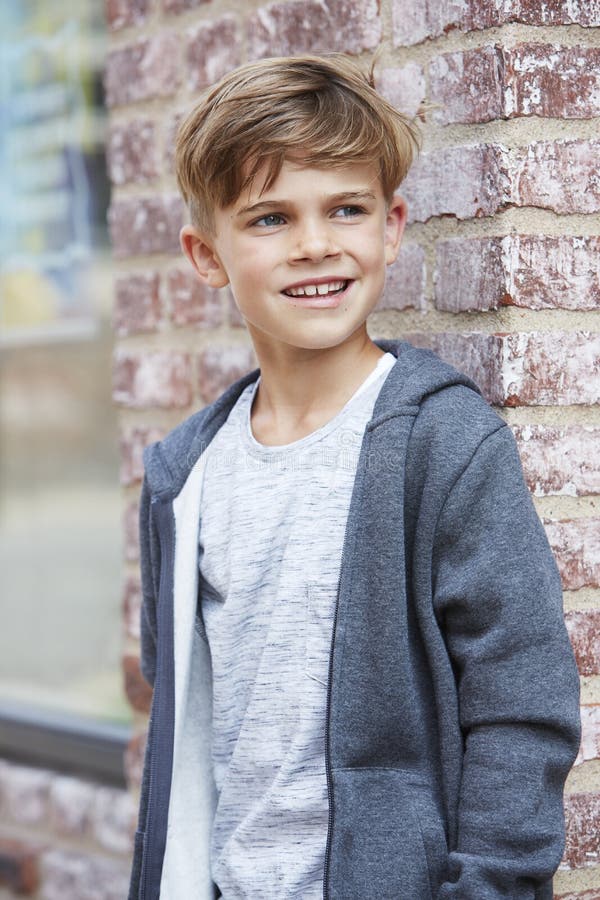 Portrait of a Young Boy, Outside Stock Image - Image of front, grey ...