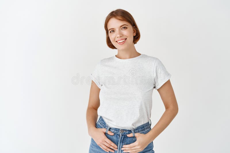 Portrait of Young Candid Woman in T-shirt, Holding Hands in Jeans and  Smiling Happy, Standing on White Background Stock Photo - Image of casual,  model: 212895010