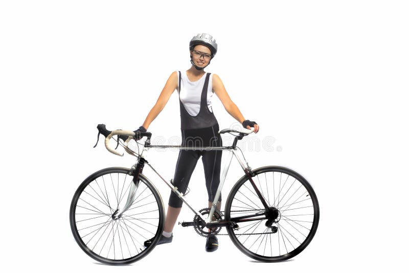 Portrait of young caucasian sportswoman professionally equipped standing with bicycle isolated over white. horizontal shot