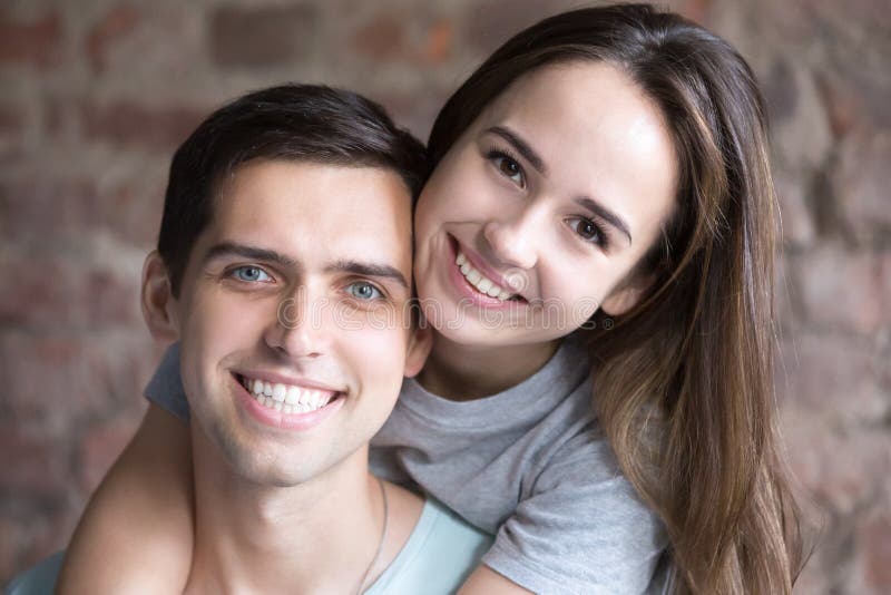 Portrait of young couple in love, smiling people stock photo