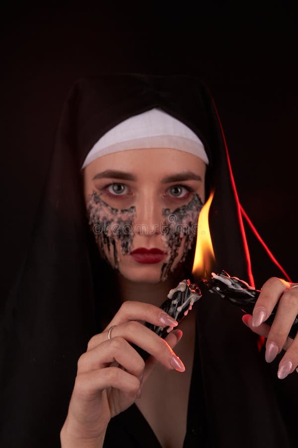 Gothic girl with candles stock photo. Image of black - 13752430