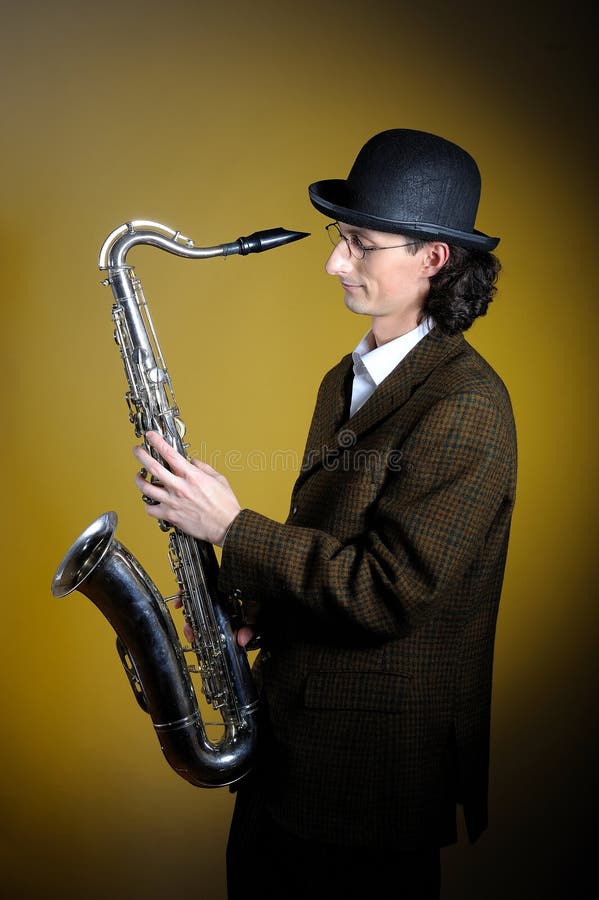 Portrait of young gentleman playing saxophone