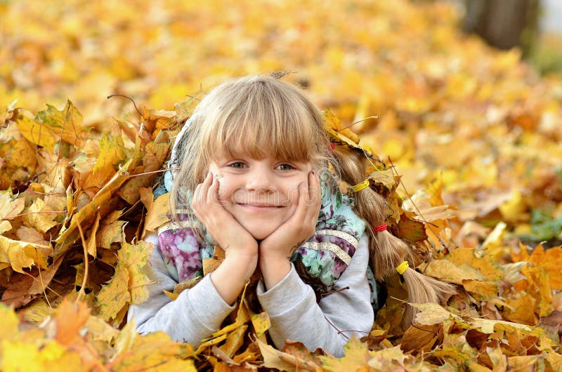 Portrait of a Young Girl in the Autumn Season Stock Photo - Image of ...