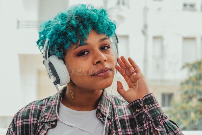 Girl with Blue Curl Hair and Headphones at Home or Apartment Stock Photo -  Image of earphones, indoors: 174106548