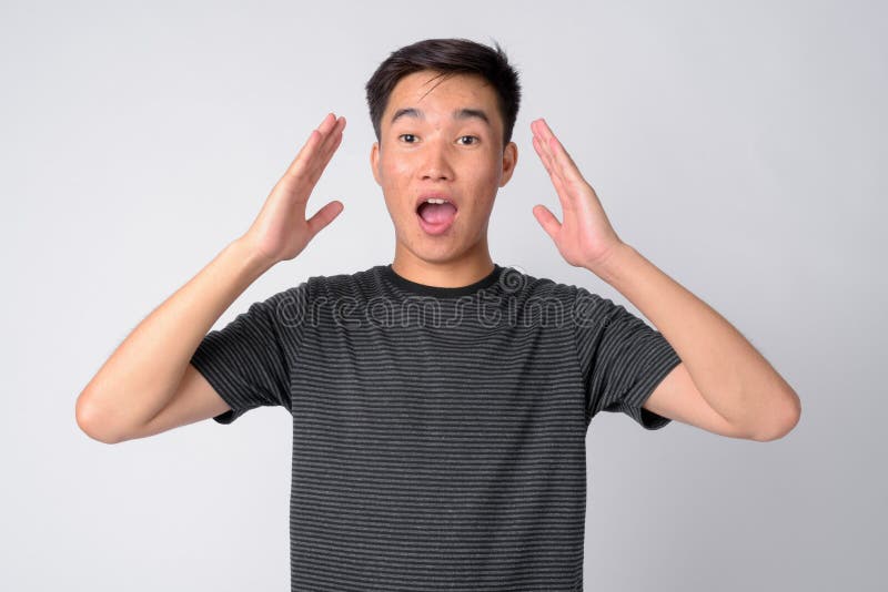 Portrait of Young Handsome Asian Man Looking Shocked Stock Image ...
