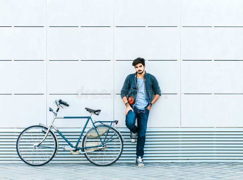 Young Handsome Guy on a Bicycle in Urban Environment. Stock Image ... - Portrait Young HanDsome Guy Bicycle Urban Environment Young HanDsome Guy Bicycle Urban Environment 135810139