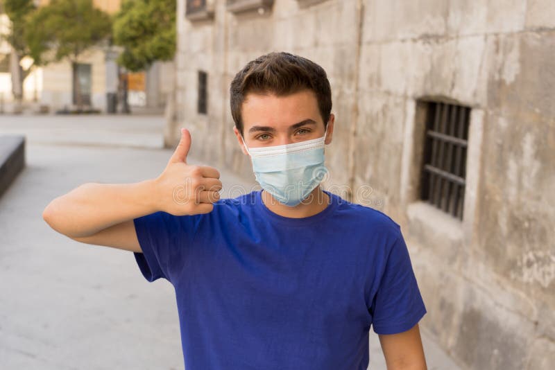 Portrait of Young Happy Man with Protective Surgical Face Mask in ...