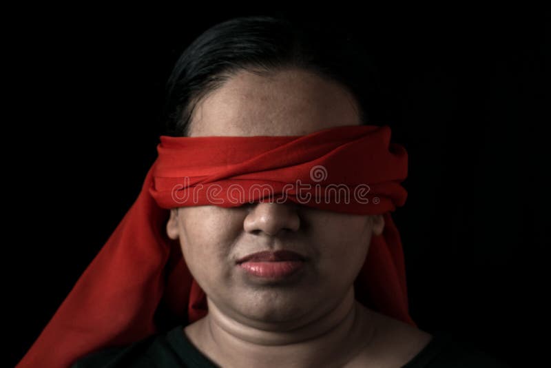 Wearing a blindfold hi-res stock photography and images - Alamy