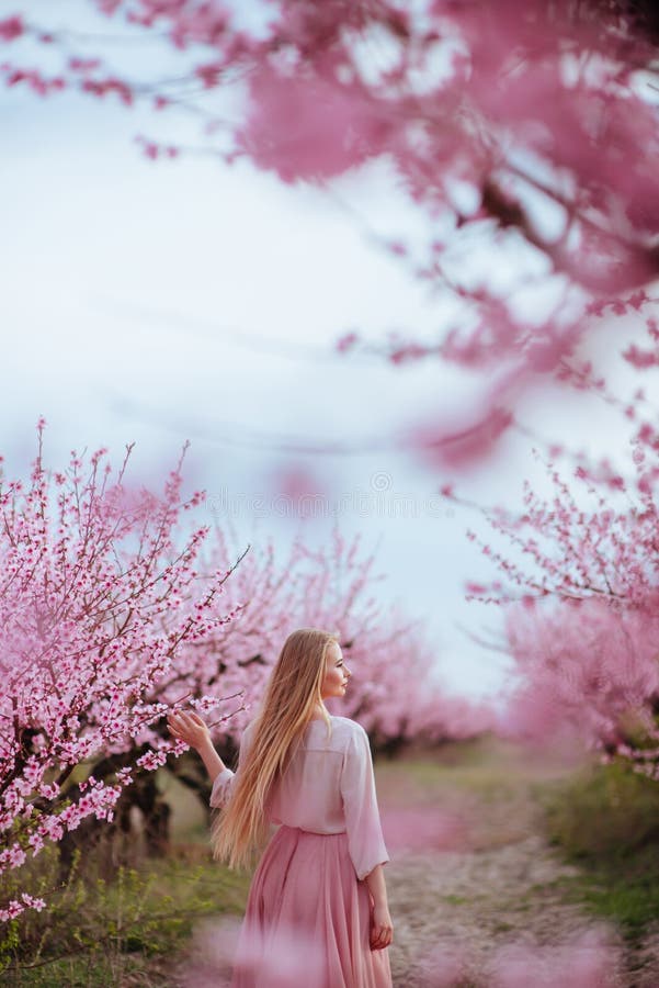 Portrait of Young Lovely Woman in Spring Flowers Stock Image - Image of ...