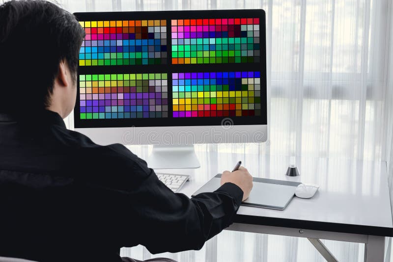 Portrait of young male designer, Freelance working with colors a