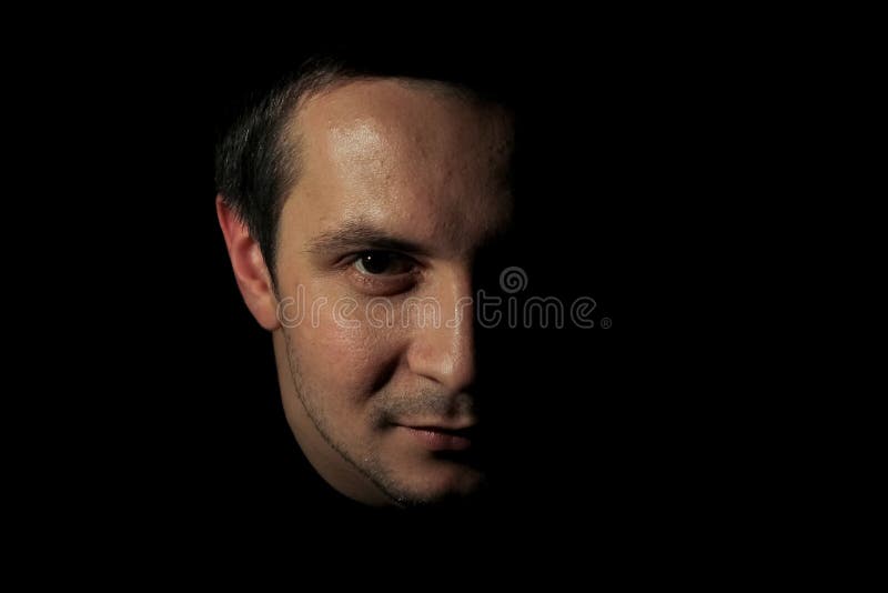 Portrait of a Young Man in Dark Key. Guy`s Portrait on Black Background ...