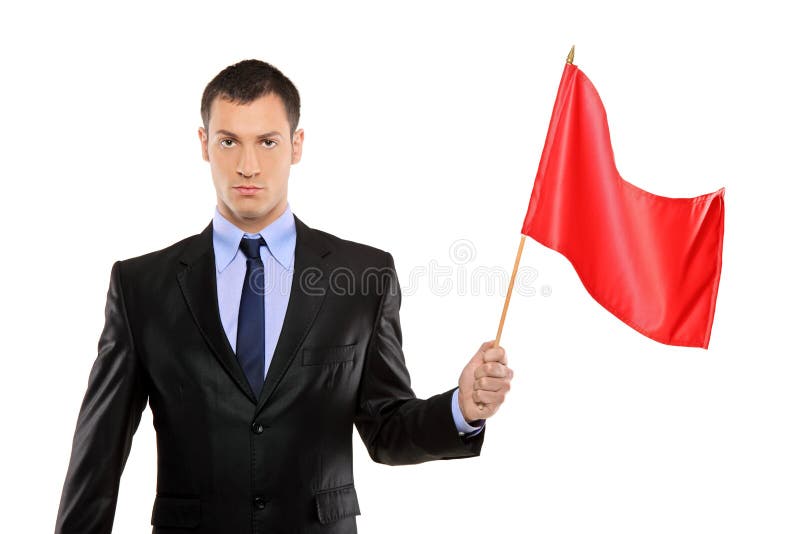 Portrait of a young man holding a red flag royalty free stock photography Portrait of a young man holding a red flag royalty free stock photography