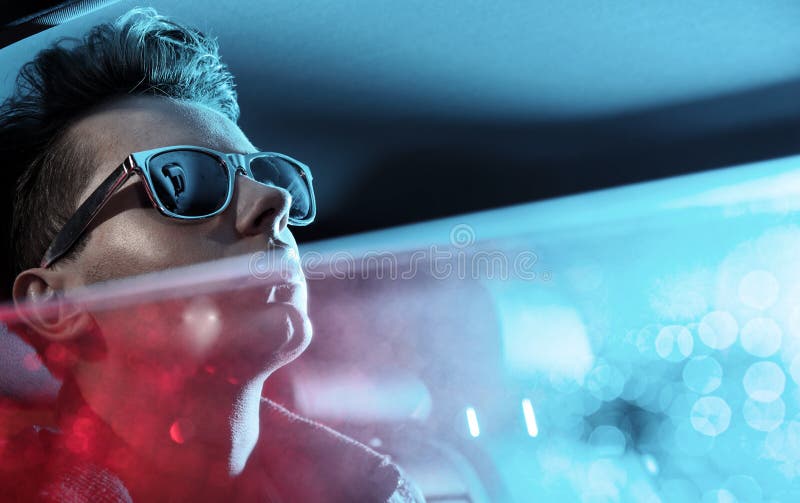 Portrait of a young man looking behind the window royalty free stock images Portrait of a young man looking behind the window royalty free stock images