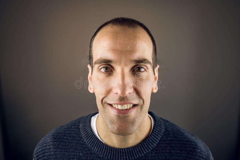 Portrait of a young man looking at the camera with happy expression and smiling royalty free stock photos Portrait of a young man looking at the camera with happy expression and smiling royalty free stock photos