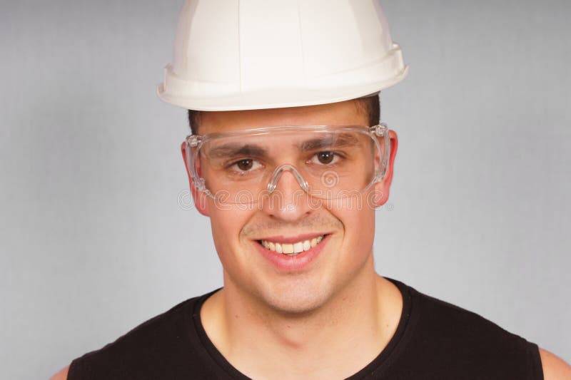 Portrait young man in a protective helmet