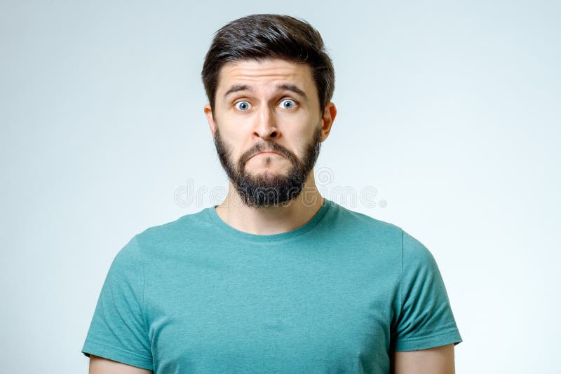 Portrait of a Young Man with a Sad Expression on His Face Stock ...