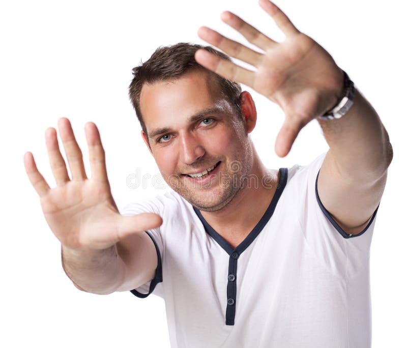 Portrait of a Young Man Standing Against White Background Stock Image