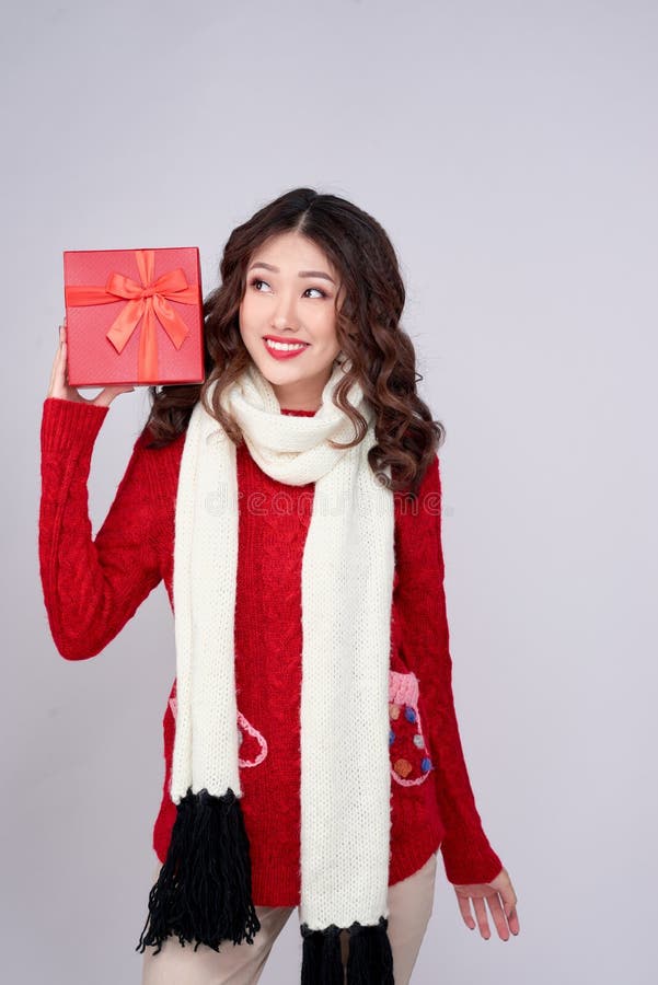 Portrait of young, pretty and happy woman with christmas gift box stock photos Portrait of young, pretty and happy woman with christmas gift box stock photos