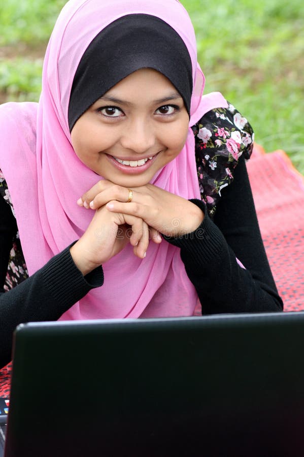 Portrait of young pretty muslim woman