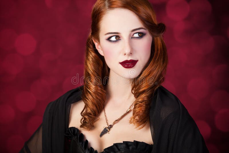 Portrait of a young redhead woman